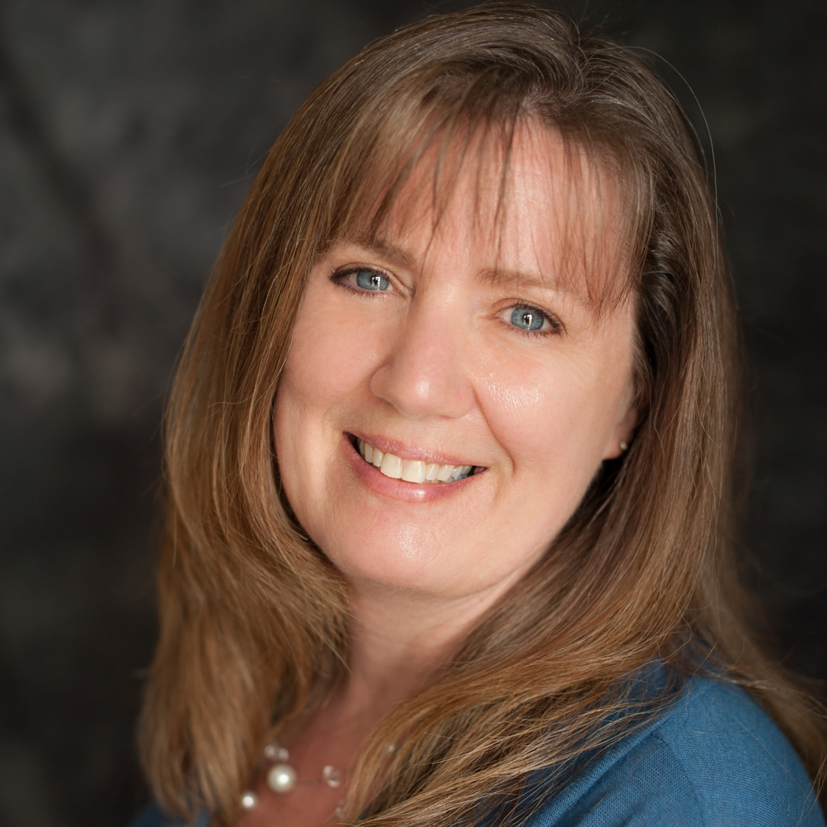 photo of Jean with blue shirt