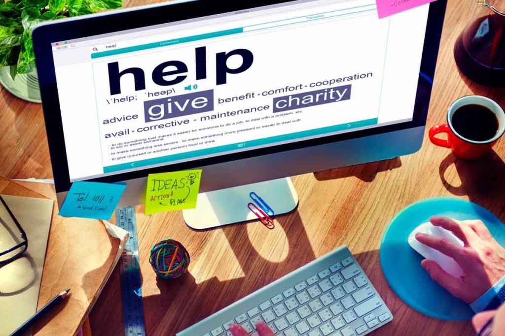 words help give charity displayed on computer monitor